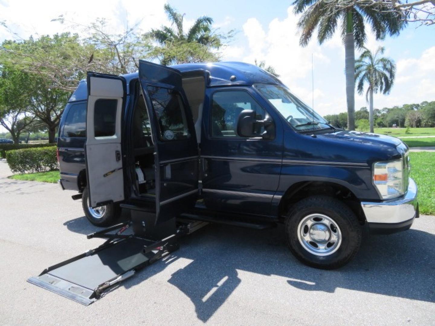 2011 Dark Blue /Gray Ford E-Series Wagon E-350 XLT Super Duty (1FBNE3BS4BD) with an 6.8L V10 SOHC 20V engine, located at 4301 Oak Circle #19, Boca Raton, FL, 33431, (954) 561-2499, 26.388861, -80.084038 - You are looking at a Gorgeous 2011 Ford Econoline E350 XLT Norcal Max High Top Handicap Wheelchair Conversion Van with 6.8L V10, 15K Original Miles, 9 Inch Lowered Floor, Braun UVL Side Entry Wheelchair Lift, Remote Control Power Side Entry Doors, Expanded Side Entry Doors, Q Straint Tie Down, Syste - Photo#46